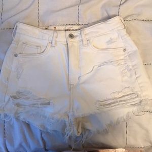White ripped denim shorts